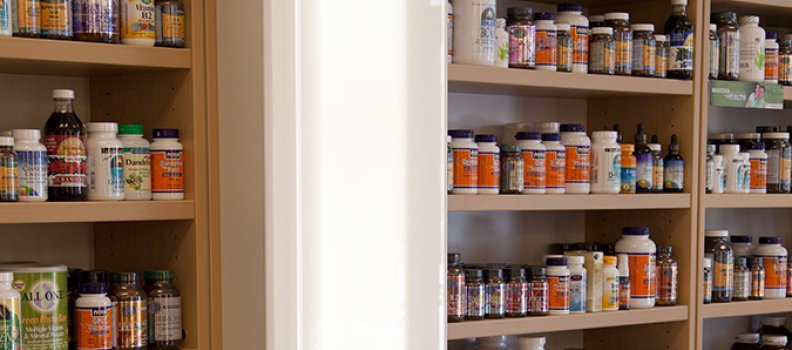 StandOff Caps and Barrels are used to mount long panels creating lighted accents on the walls at Complete Nutrition in Reno.